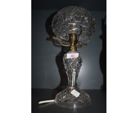 An early clear cut crystal table or side lamp having mushroomed dome top