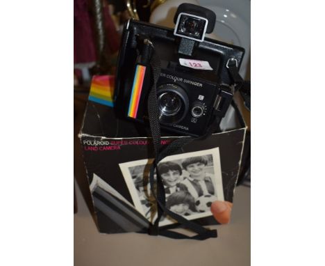 A Polaroid Super Colour Swinger II camera in original box