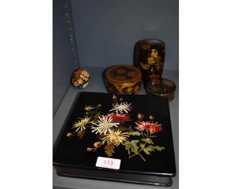 A selection of Victorian and similar hand decorated lacquer and papier mache trinket and jewellery cases