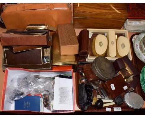 A Zenith gilt metal alarm travelling time piece in fitted case, a complete set of gram weights, the fitted box stamped L. Oer