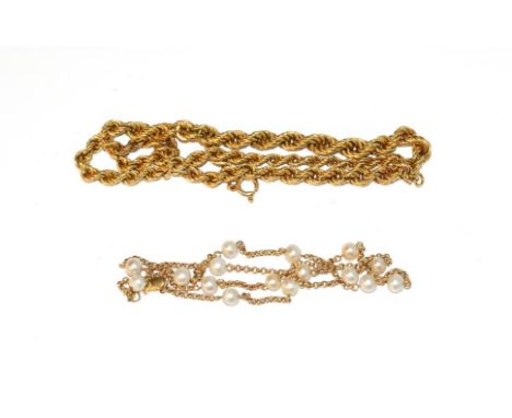 An 18 carat gold graduated ropetwist necklace, length 43cm; and a trace link chain interspaced by cultured pearls, stamped '3