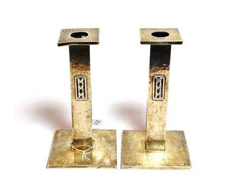 A pair of American Arts and Crafts silver candlesticks, by Lebolt and Co. Chicago, Circa 1920, Model 309, each on square base