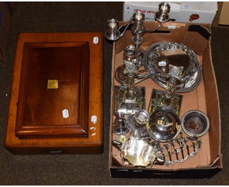 A collection of assorted silver plate, including a pair of candlesticks with Corinthian capital sockets, a pair of telescopic