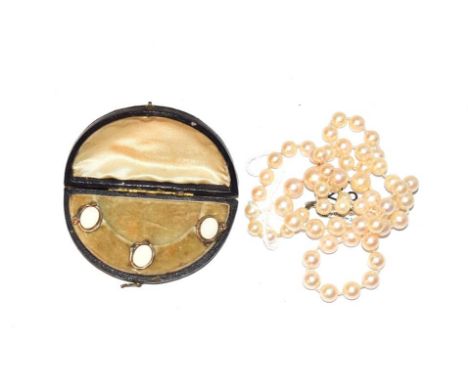 Three serpent studs, cased and a single row cultured pearl necklace with diamond set clasp, unmarked, length 57cm .  Studs - 
