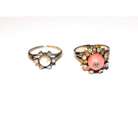 A diamond and cultured pearl cluster ring, unmarked, finger size M1/2; and a coral and diamond cluster ring, unmarked, finger
