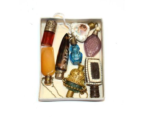 Eight various scent bottles, five with various glass bodies and silver or metal mounts, another tortoiseshell and with silver