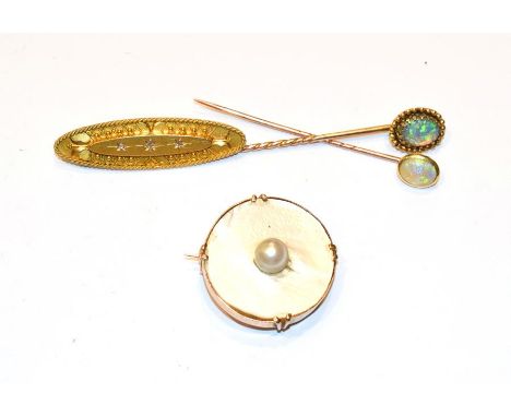 Two opal stick pins, a 15 carat gold diamond bar brooch, length 4.2cm and a mother-of-pearl and pearl brooch, frame stamped '