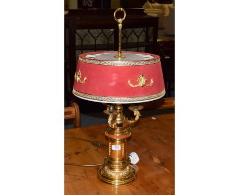 An Empire style gilt metal three branch table lamp 