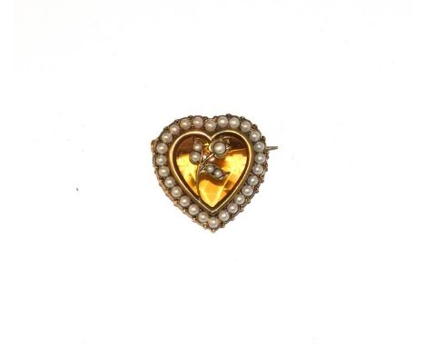 A citrine and split pearl brooch, the heart shaped citrine in a yellow rubbed over setting, within a border of split pearls, 