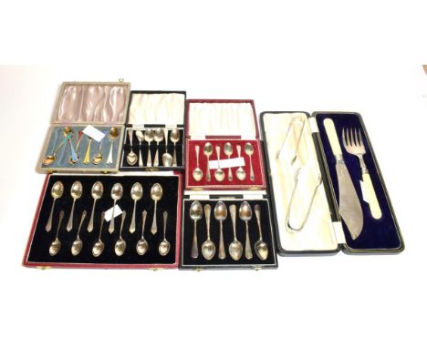 A collection of silver spoons, comprising three cased sets of six silver coffee spoons, a set of twelve silver coffee spoons 