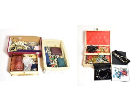 A quantity of costume jewellery including brooches, necklaces, plated jewellery, simulated pearls, beaded jewellery, wristwat