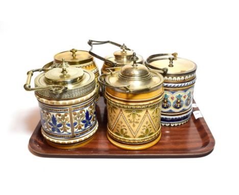 Mettlach biscuit barrels and covers with traditional decoration, painted mounts and lids, including three Villeroy &amp; Boch