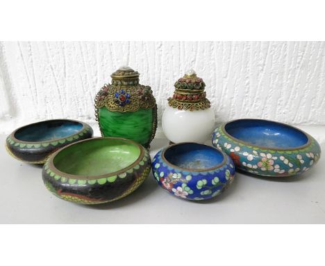 A Burmese white jade snuff bottle with gem set gilt metal mounts, a green and white Peking glass snuff bottle with gem set gi