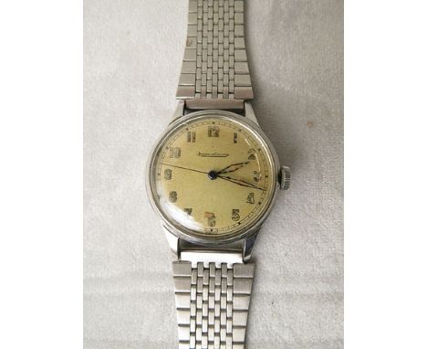 A 1950s gents Jaeger Le Couture gents stainless steel wrist watch, manual wind, case number 314483, later strap, watch not ru