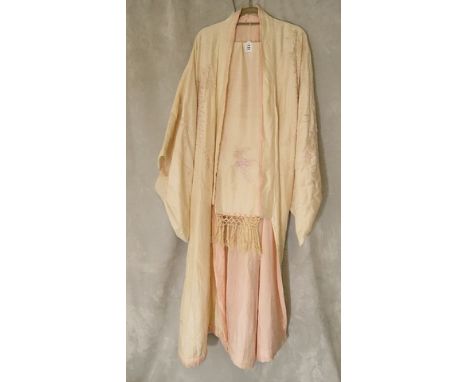 A vintage silk embroidered kimono and obi in pale pink