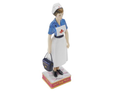 A Royal Worcester porcelain figure of a British Red Cross Society VAD member, modelled by Ronald Van Ruyckevelt, circa 1969, 