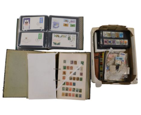 A collection of philatelic first day covers and stamps, including a general collection of world stamps (1 album), British com