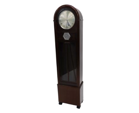 A 1930s Art Deco style eight-day longcase clock, in mahogany case, the silvered dial with Arabic numerals, and set with an an