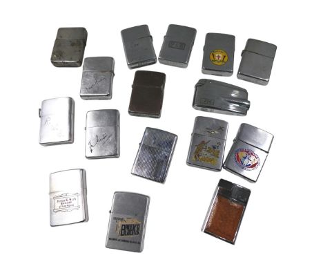 A collection of Zippo pocket lighters, each stainless steel cased, some with enamel decoration to include NASA, and others. (