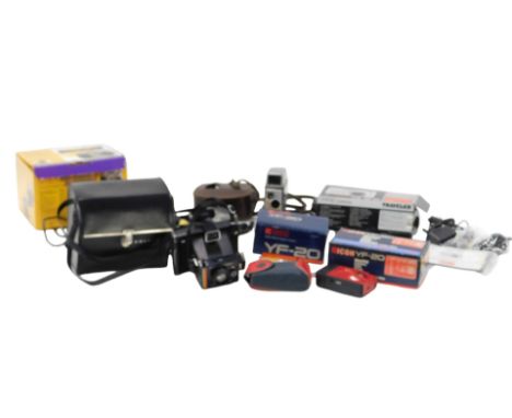 A group of camera and equipment, comprising a Rico YF20, boxed, a Traveller DC-XZ6, boxed, a Bell &amp; Howell Auto Set 624EE