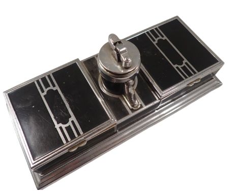 A Ronson Art Deco table lighter, formed with two square sections, cigarette box, centred by lighter, on black enamel and chro