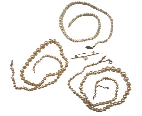 Cultured pearl and other jewellery, comprising a 9ct gold pearl set single pin brooch, 4.5cm wide, and two cultured pearl nec