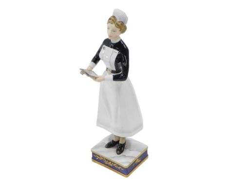 A Royal Worcester porcelain figure of a Sister of University College Hospital, modelled by Ruth Van Ruyckevelt, circa 1965, m