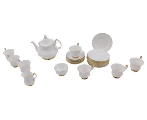 A Royal Albert Val D'or pattern part tea service, comprising teapot, milk jug, sugar bowl, seven tea cups and saucers, and tw