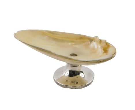 A George V silver and mother of pearl shell trinket dish, the top formed as a shall on a silver plated base, maker WV&amp;S, 