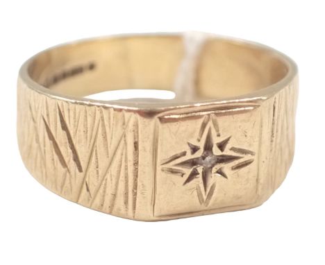 A 9ct gold dress ring, the square set central panel set with tiny diamond, with cross hatched design shoulders, ring size R, 