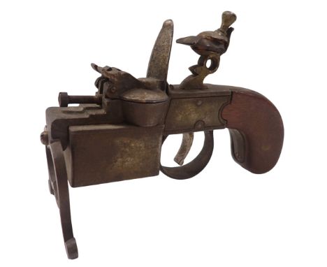 A Dunhill tinder pistol table lighter, with wooden stock, 15cm wide.