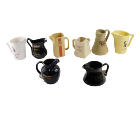 A group of Scotch whisky advertising water jugs, including Grants, Dewar's, Langs Supreme, etc. (8)