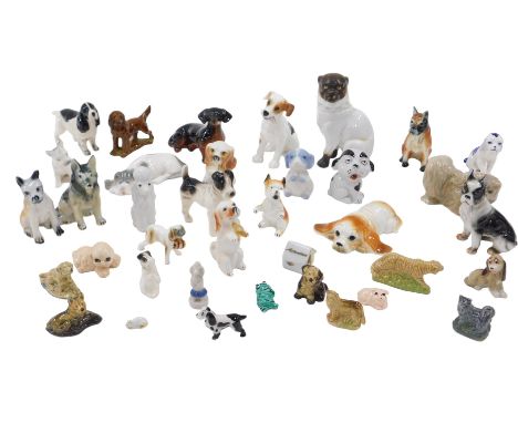 A collection of ceramic model dogs, including a Continental porcelain model of a seated Pug, Doulton terrier (AF), Spaniel, D