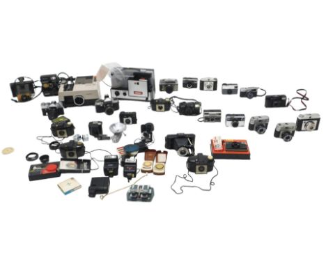 Various cameras, including a Praktica Super TL SLR, a Taron SLR with ever ready case, and other cameras by Ilford, Kodak, inc