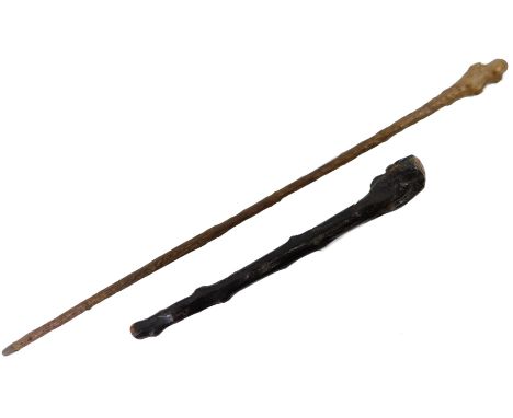 A walking stick, with brass capped end, 91cm long, and a Shillelagh with carved inscription, 51cm long.