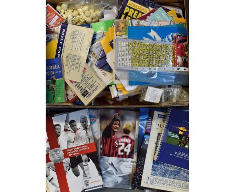 Assorted Box of Football Ephemera includes various programmes, cards, magazines, press packs, coins, figures and more, inspec
