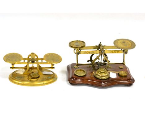 Domestic Postal Scales one on mahogany base the other on oval base (2)