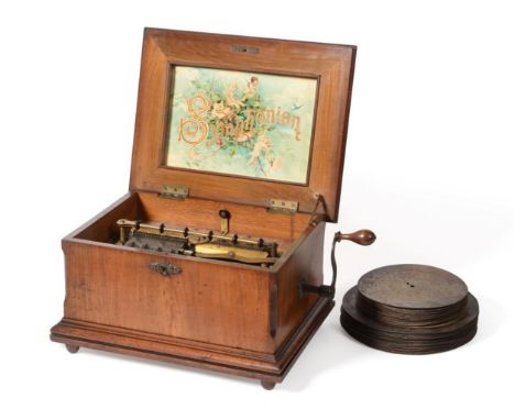 Symphonium Disc Music Box playing 9.5'' discs, with twin combs both marked 'Schutz Marke Made in Germany' with lever controll