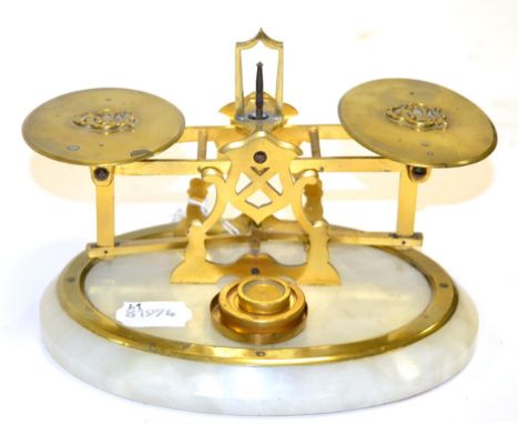 Domestic Postal Scales with oval trays bearing monogram CGG (?) on oval onyx base with two weights 7.5'', 19cm