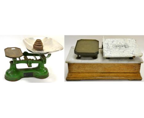 Avery Balance Scales with one ceramic plate (damaged) on wooden base with marble top; together with a set of cast iron shop s