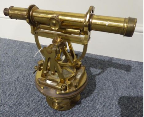 Troughton & Simms (London) Brass Theodolite on circular mount with central compass and twin spirit levels (a third on the bar