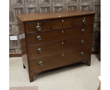 SCOTTISH REGENCY MAHOGANY OBLONG CHESTof three short and three long graduated cockbeaded drawers, with thistle embossed handl