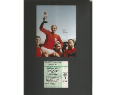 Bobby Mooore signed 1968 ticket to the England V Sweden football match, mounted with 1966 World Cup colour photo in black mou