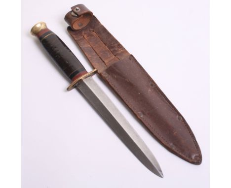 British Private Purchase Officers Combat Knife complete with the original leather scabbard. Blade has Sheffield makers mark f