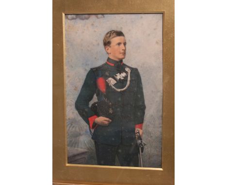 Hand Painted Image of Captain R F M Sims Kings Royal Rifle Corps, shows the subject wearing full dress uniform holding astrak