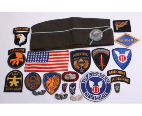 Selection of American Military Insignia and Badges mostly relating to Airborne troops including a parachute qualification win