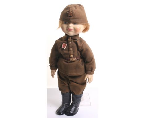 Wartime Period Soviet Russian Childs Doll, showing a female soldier in the Russian army. Full detailed tunic, trousers, boots