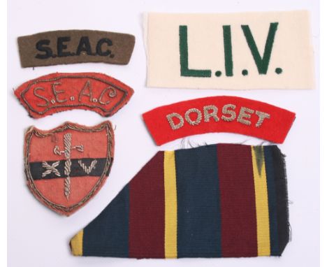 Dorset South East Asia Command Cloth Insignia Grouping consisting of a silver bullion on red DORSET shoulder title, bullion S