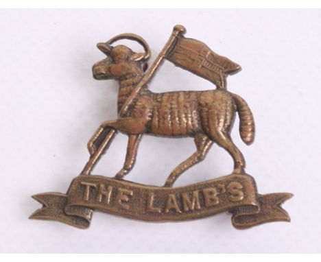 Rare WW1 Light Armoured Motor Battery (THE LAMB'S) Collar Badge in gilt brass with two lug fittings on the reverse. 