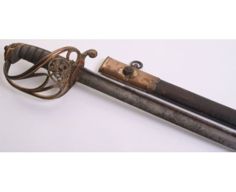 British George IV 1822 Pattern Infantry Officers Sword with gilt swept three bar hilt having cipher to the middle. Fish skin 